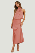 Elegant Carola - Halter Neck Satin Dress features a modern design, perfect for showcasing your style and sophistication.