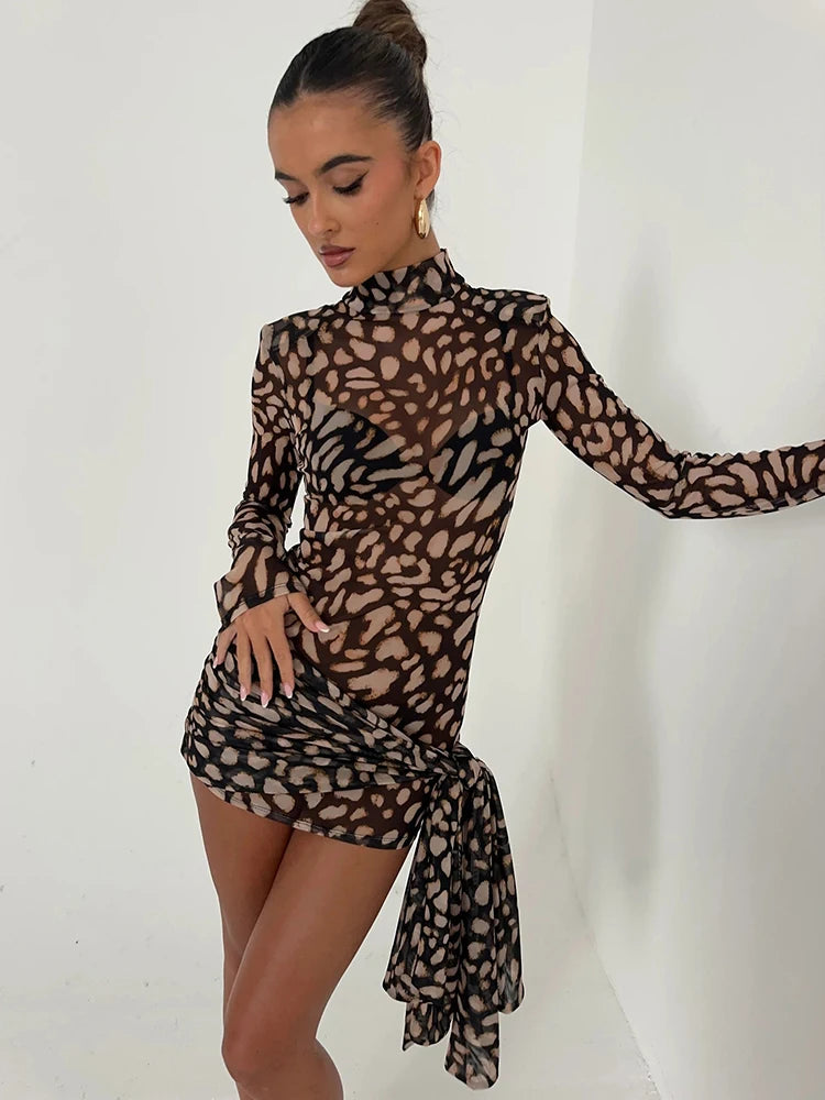 Stylish model showcasing the Filou - Sexy Leopard Dress with a chic design and flattering fit. Perfect for any occasion.