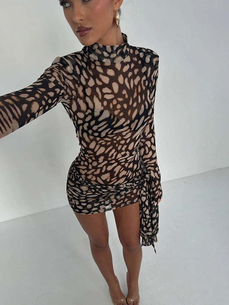 Stylish model showcasing the Filou - Sexy Leopard Dress, perfect for a chic and daring look.